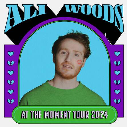 Ali Woods with a lipstick mark on his cheek