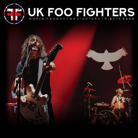 UK Foo Fighters poster. It's a photo of the band playing live on stage.